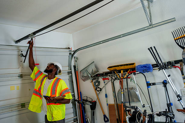 Professional Garage Door Panel Replacement technician working in Hood River, OR